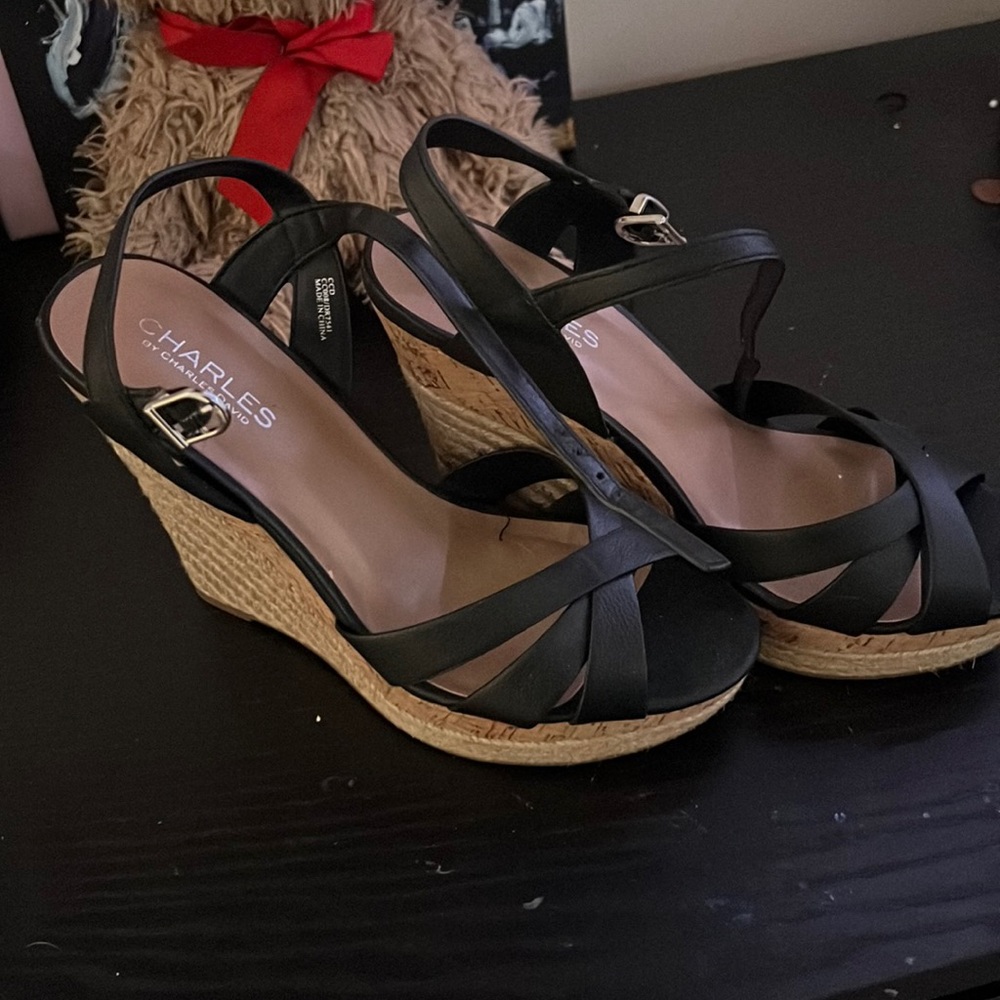 Selling black and tan wedges!